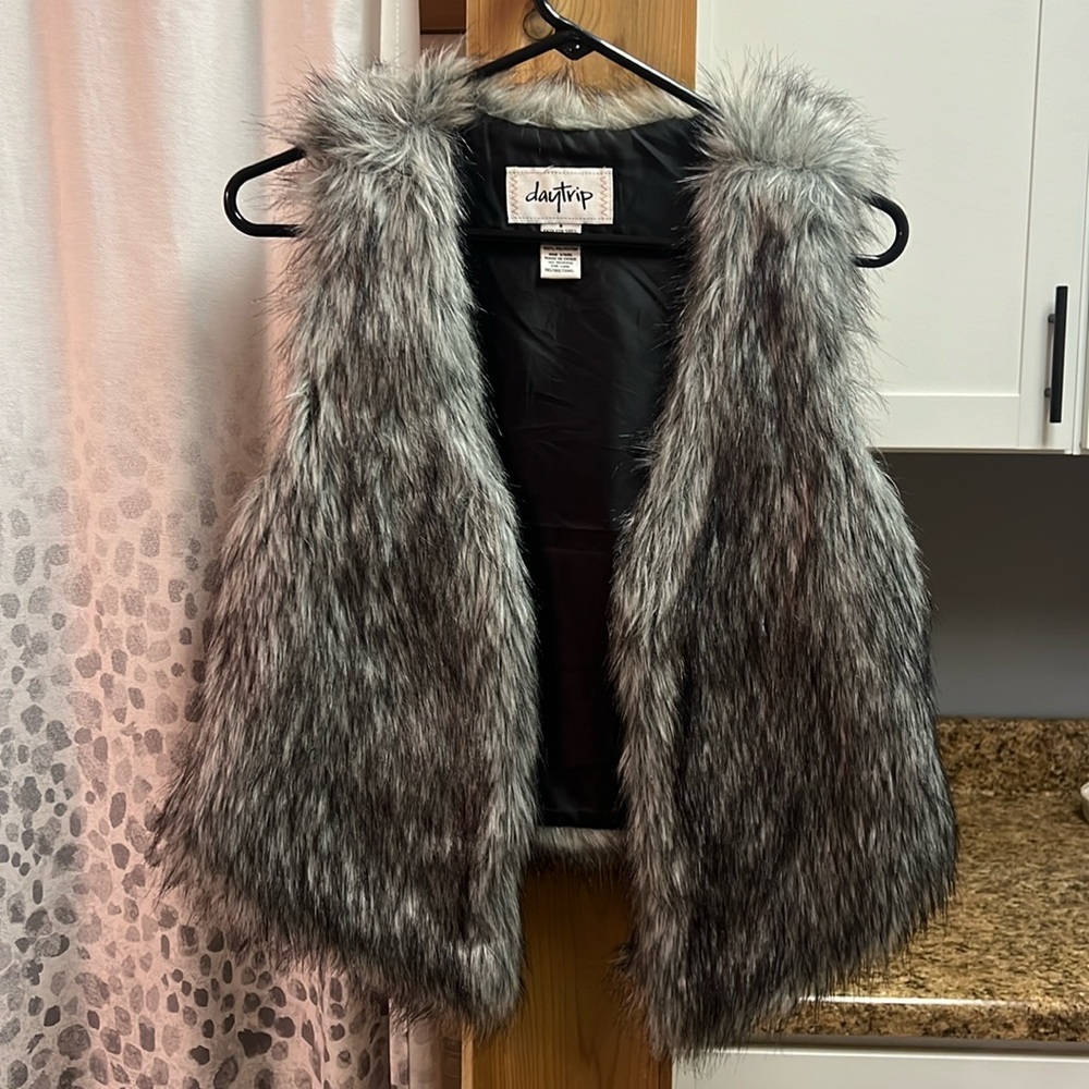 Small gray fur vest
